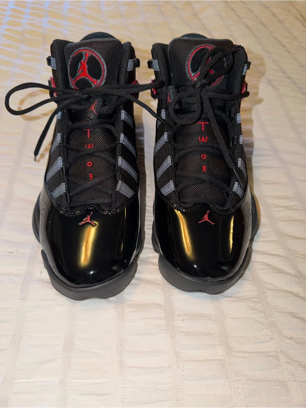 Jordan 6 Rings Anthracite Fire Red Men’s Black and Red High-Top Athletic Sneaker